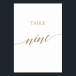 Elegante Gold Calligraphy Table Neun Tischnummern<br><div class="desc">Dieser elegante Goldkalligraphie-Tisch mit neun Tischnummern eignet sich perfekt für eine einfache Hochzeit. Das neutrale Design besticht durch eine minimalistische Karte, die mit romantischen und skurrilen Imitaten mit Goldfolien-Typografie dekoriert ist. Die Karte druckt auf der Vorder- und Rückseite (beidseitig). Andere Tischnummern in der Sammlung werden separat verkauft. Bitte beachten Sie:...</div>