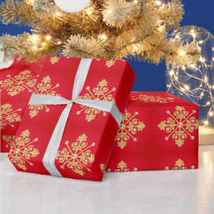 Elegante Gold Weihnachts-Schneeflocke auf Rot Geschenkpapier