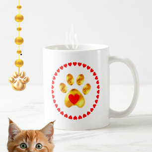 Elegante goldene Pfote mit Herzen Tasse