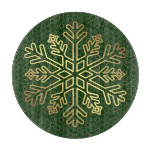 Elegante grüne und goldene Schneeflockendekoration Schneidebrett