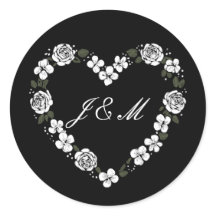 Elegante Hochzeit in Schwarz-Weiß mit floralem Her