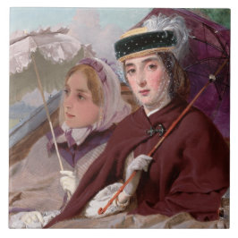 Elegante junge Ladys, die in einer Beförderung rei Fliese