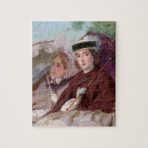 Elegante junge Ladys, die in einer Beförderung rei