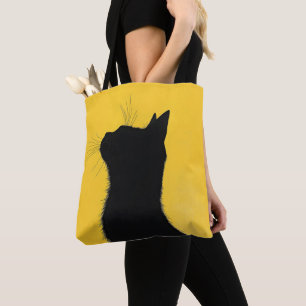 Elegante lustige schwarze Katze auf gelbem Hinterg