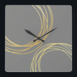 elegante moderne Imitate goldene geometrische Krei Quadratische Wanduhr<br><div class="desc">Minimalistisches,  modernes und stilvolles Design,  das die goldenen Imitate und den grauen Hintergrund darstellt.</div>