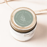 Elegante Mond und Stars Grüne Gastgeschenk Hochzei Runder Aufkleber<br><div class="desc">Fügen Sie Ihren Umschlägen,  Gastgeschenke Hochzeiten und vielem mehr eine personalisierte Touch hinzu,  mit diesen eleganten Moon- und Stars-Grünen Hochzeitsaufklebern. Das Design zeigt eine weiße Linie Kunstdarstellung eines Mondes mit Sternen und Blattwerk auf einem schlängelgrünen Hintergrund. Ihre Namen und Ihr Hochzeitstermin werden in weißer Schrift angezeigt.</div>