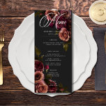 Elegante Moody Mutes Rost & Burgund Blumenhochzeit Menükarte<br><div class="desc">Mit unserem fesselnden, langen Hochzeitsmenü können Sie Ihre gotisch inspiriert Feier zeitlos elegant gestalten. Ein weicher schwarzer Hintergrund bietet die perfekte Leinwand für einen fesselnden, aber dennoch schlichten Bouquet. Stellen Sie sich ein Eckchen aus gedämpfter Rose vor, in dem sich Rostrot und Bordeaux-Farbtöne mit dunkelgrünem Blattwerk vermischen. Dieses ätherische Design...</div>