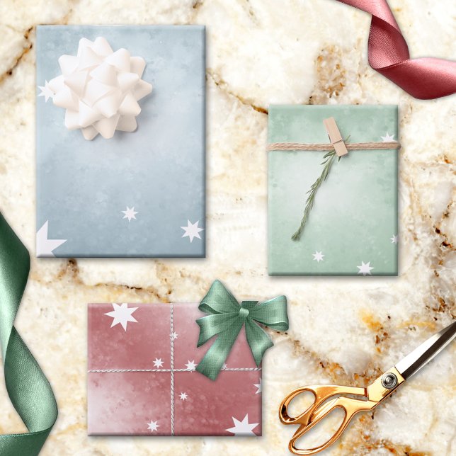 Elegante Pastel Abstrakt Star Muster Weihnachten Geschenkpapier Set (Lovely pastel fantasy star pattern Christmas wrapping paper sheets in blue, red and green.)