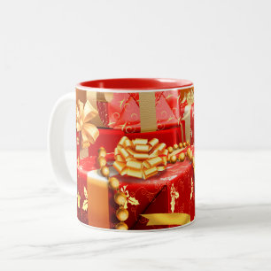 Elegante rote und goldene Geschenke zum Fest Zweifarbige Tasse