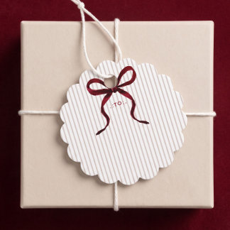 Elegante rote Wasserfarbe-Schleife Weihnachten An Geschenkanhänger