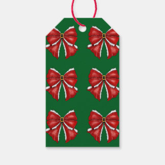 Elegante rote Weihnachtsbögen auf dunklem Grün Geschenkanhänger