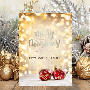 Elegante rote Weihnachtskugeln Bokeh Feiertagskarte