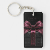 Elegante schwarze Geschenkbox mit burgunderroter S