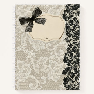 Elegante schwarze Schleife und florale Damastborte Notizbuch
