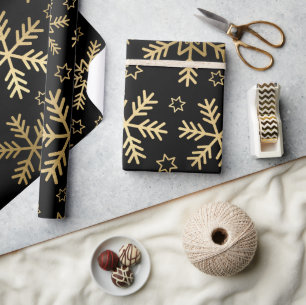 Elegante schwarze und goldene Folien-Schneeflocken Geschenkpapier