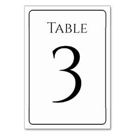Elegante Tischnummern in Weiß und Schwarz