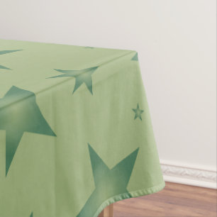 Elegante und stilvolle Olive Stars auf dem Sage Gr Tischdecke
