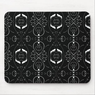 Elegante weiße Schnörkel und Verzierung auf Schwar Mousepad