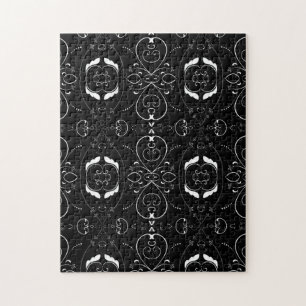 Elegante weiße Schnörkel und Verzierung auf Schwar Puzzle