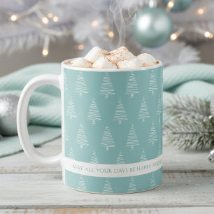 Elegante weiße und hellgrünblaue Weihnachtsbaumen Kaffeetasse