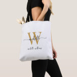 Elegante White Gold Girly Personalisiert Mit Monog<br><div class="desc">Girly Simple Elegant Modern White and Gold Monogram Initial Name Signature Script Custom Personalisiert Tote Bag. Dieses Design mit Ihrem Vornamen in einem hübschen handgeschriebenen Stil Swash Schwanz Schriftart Typografie (oder Kalligrafie) mit Monogramm Initial- und Familienname oder Vollname in Gold und Schwarz auf weißem Hintergrund. Große Frauengeschenke zum Geburtstag, Weihnachten,...</div>