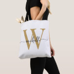 Elegante White Gold Girly Personalisiert Mit Monog<br><div class="desc">Girly Modern Simple Elegant White and Gold Monogram Initial Name Signature Script Custom Personalisiert Tote Bag. Dieses Design mit Ihrem Vornamen in einem hübschen handgeschriebenen Stil Swash Schwanz Schriftart Typografie (oder Kalligrafie) mit Monogramm Erstmaligkeit in Gold und Schwarz auf weißem Hintergrund. Große Frauengeschenke zum Geburtstag, Hochzeit, Weihnachten, 16 Geburtstagsparty, Brautparty,...</div>