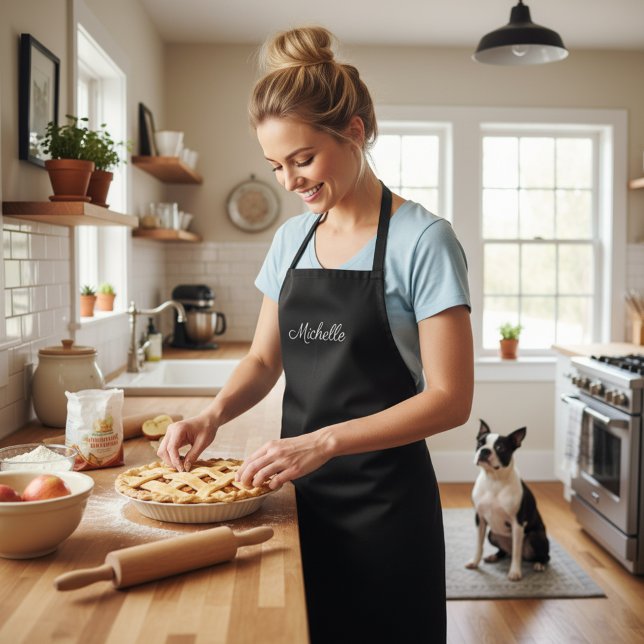 Eleganter Cursive Script Name Michelle Long Black Schürze (Elegant black long apron personalized with a custom name printed in a stylish cursive.)