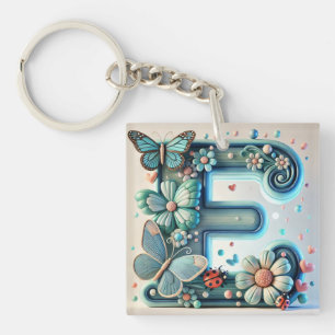 Eleganter floraler Buchstabe E mit Schmetterlingen Schlüsselanhänger