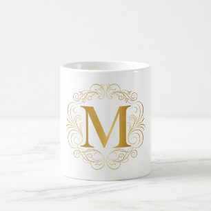 Eleganter Gold-Monogramm-M-Anfangsbuchstabe Luxus- Kaffeetasse