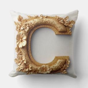 Eleganter goldener Buchstabe C mit zarten Blumen Kissen