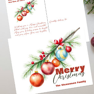 Eleganter Kiefernzweig mit Weihnachtsdekoration Feiertagspostkarte