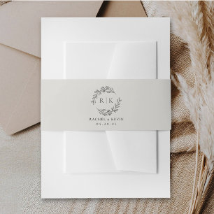 Eleganter Kranz-Monogramm in neutralem Beige für d Einladungsbanderole