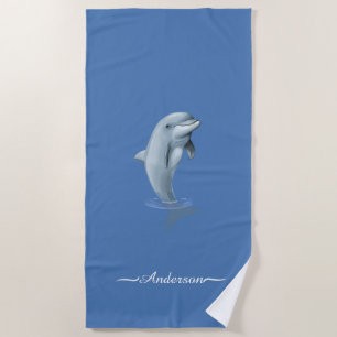 Eleganter moderner Delfin und Schrift auf wundersc Strandtuch