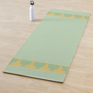 Eleganter, moderner goldener Buddha auf Lorbeergrü Yogamatte