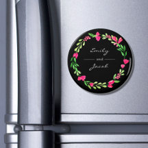 Eleganter rosafarbener Blumenreath Schwarzer Name 