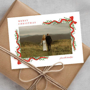 Eleganter roter Bogen mit Grün-Foto Weihnachten