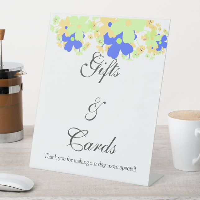 Elegantes Blumendesign gelb-blau Sockelschild (In Situ)