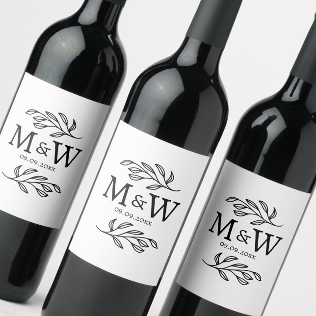 Elegantes botanisches Monogramm-Hochzeitsdatum Weinetikett (Modern wedding couple monogram initials date wine bottle label)