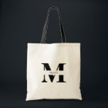 Elegantes einfaches, modernes Schwarzes Personalis Tragetasche<br><div class="desc">Diese elegante und moderne schwarze Tasche ist das ultimative Accessoire für jedes Party oder jede Brautjungfrau. Das elegante, minimalistische Design ist perfekt für jeden Anlass. Die ausgeklügelte schwarze Farbe strahlt zeitlose Eleganz aus, während das personalisierte Monogramm Name Initial eine Touch von Individualität und Charme verleiht. Diese Tasche ist ideal, um...</div>