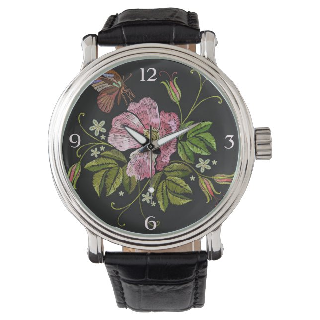 Elegantes florales Stickereimuster auf schwarzem H Armbanduhr (Vorderseite)
