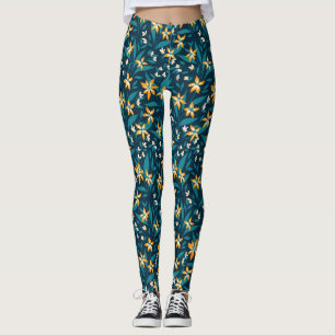 Elegantes gelbes Blumenmuster in dunkelgrünen Blät Leggings