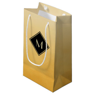 Elegantes gelbes Gelb mit einfachem Goldmonogramm Kleine Geschenktüte