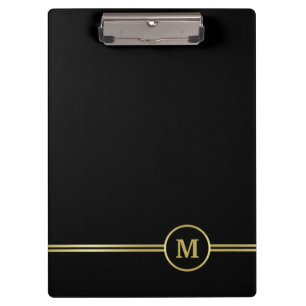 Elegantes goldenes personalisiertes Monogramm auf Klemmbrett