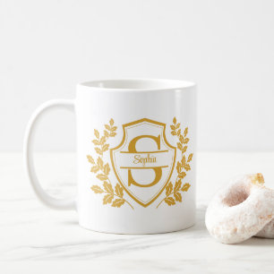 Elegantes goldenes Wappenmonogramm und Name auf ge Kaffeetasse