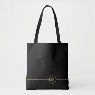 Elegantes Goldmonogramm auf schwarz