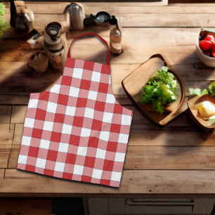 Elegantes Landpicknick mit weißen roten Karos Schürze