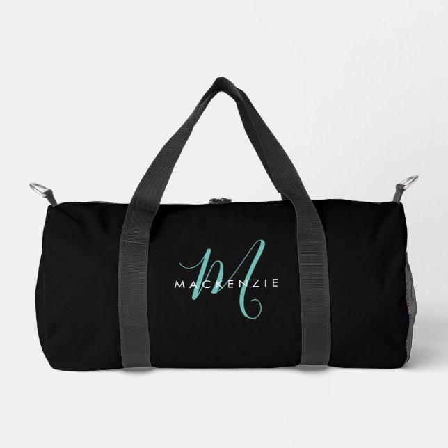 Elegantes, modernes Schwarzes Aquamarines Script M Duffle Bag (Vorderseite)