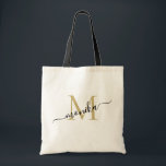 Elegantes Monogramm aus Gold und Schwarz Tragetasche<br><div class="desc">Klassische, gürtnisch minimalistische und elegante Tote-Tasche mit einem einfachen und modernen Gold- und Schwarz-Script-Monogramm. Sie können mit einem Initial und Namen im Skript personalisieren. Diese Tasche ist ein personalisiertes Geschenk für Hochzeitsfeier - Trauzeugin, Brautmädchen, Braut- und Bräutigam und Blume.</div>