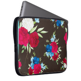 Elegantes rot-blaues Blumenmuster auf dunklem Brau Laptopschutzhülle