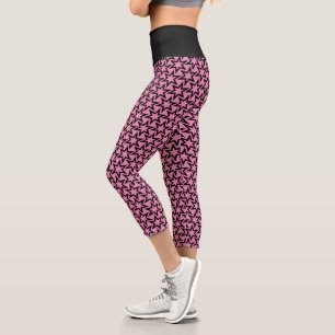 Elegantes Schwarz-Rosa Geometrisches Sternmuster Capri Leggings